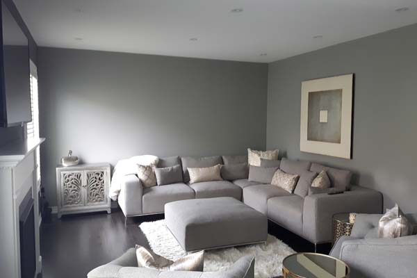 modern looking living room painted with grey walls