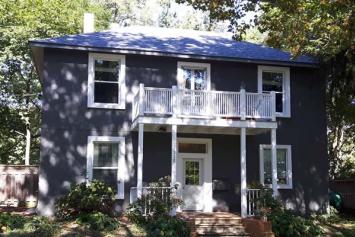 Colonial house with a new blue painting